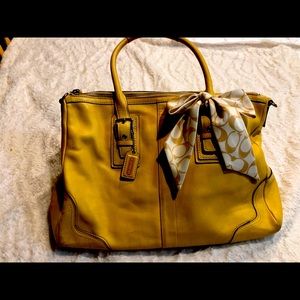 Beautiful yellow leather coach bag